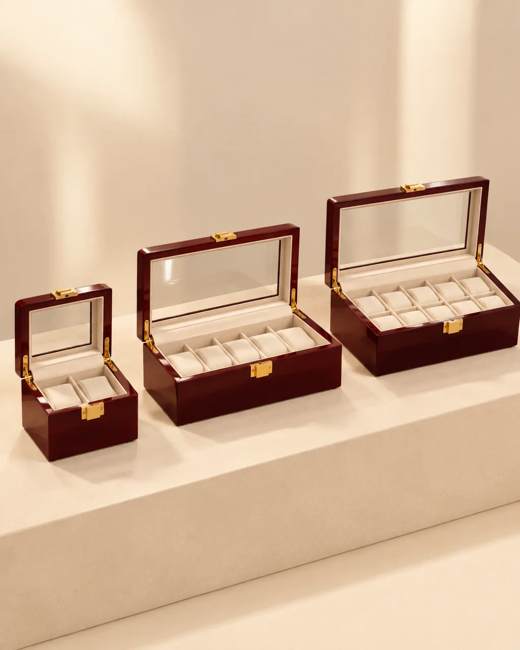 Three exact watch cases from the supplied references: an open Écrin Deux with two cushions, an open